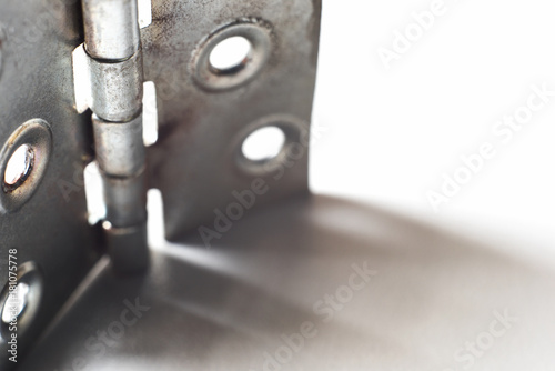 Abstract industrial background with metal hinge and shadow, soft focus