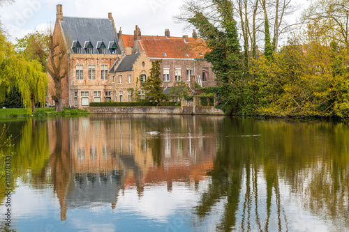 Ancient Buildings Reflected in Minnewater Lake, Bruges, Belgium © Jill Clardy