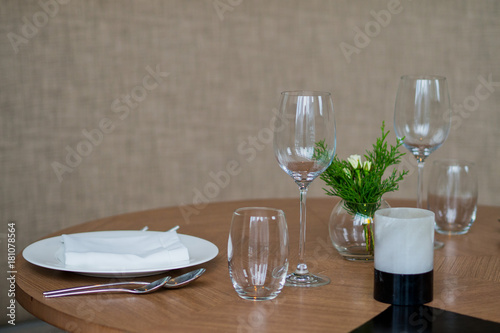 Empty glasses wine in restaurant. Glass water. Dish spoon fork on table