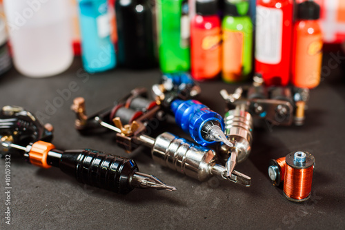 Tattoo artist table with equipment photo