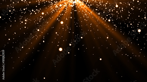 Sprinkle gold dust on a black background with copy space.