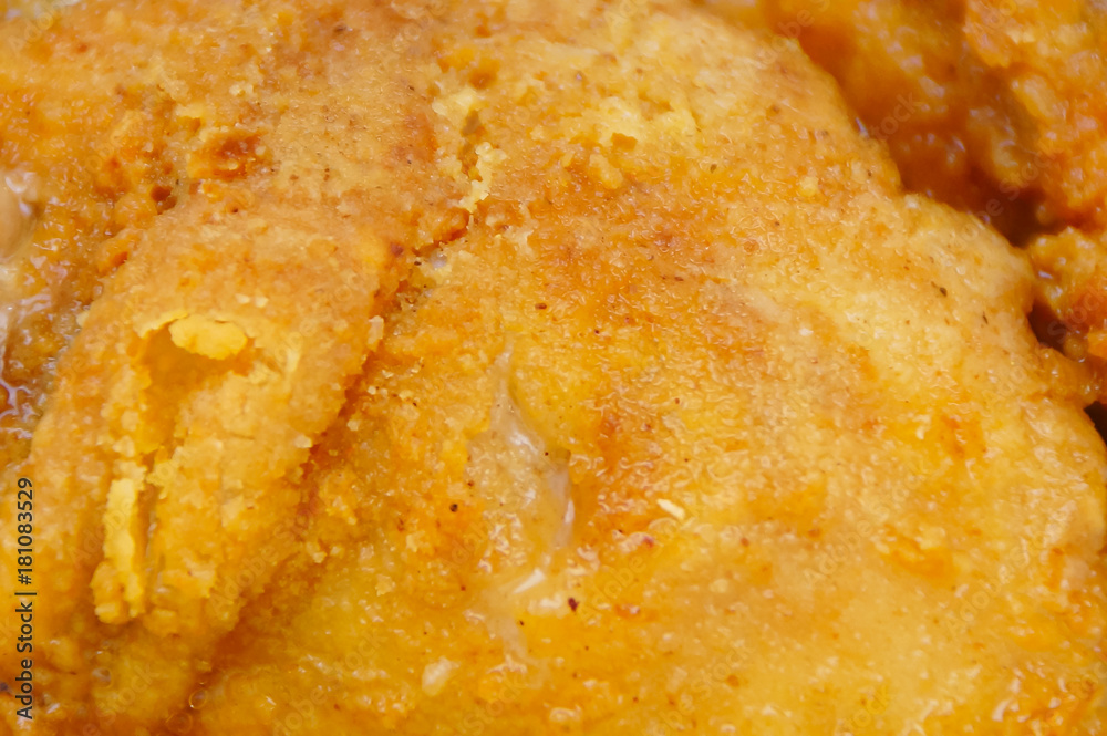 Close Up Chicken Frying In A Pan. Unhealthy Food Concept Close Up Chicken Frying In A Pan. Unhealthy Food Concept