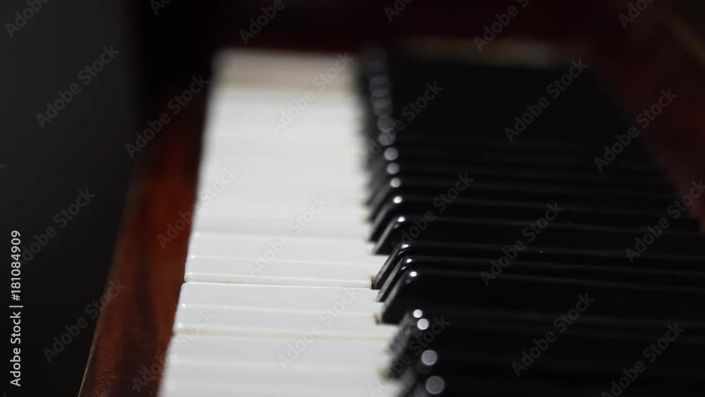 Female hands play piano keys. Work of the musician. Shooting at close range. Female hands play piano keys. Work of the musician. Shooting at close range.