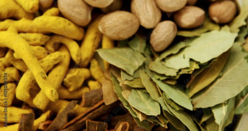 Nutmeg, bay leaf, cinnamon stick and turmeric Nutmeg, bay leaf, cinnamon stick and turmeric