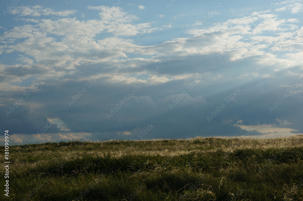 Landscape with steppe and clouds