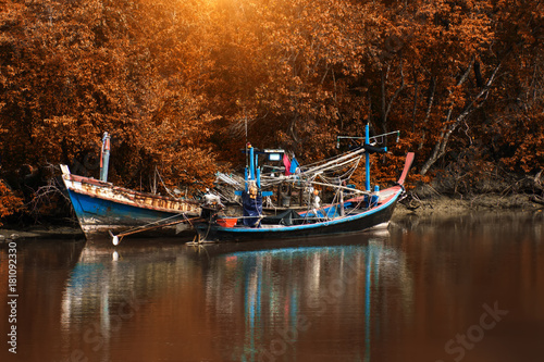 Fishing boats landing in the canal.