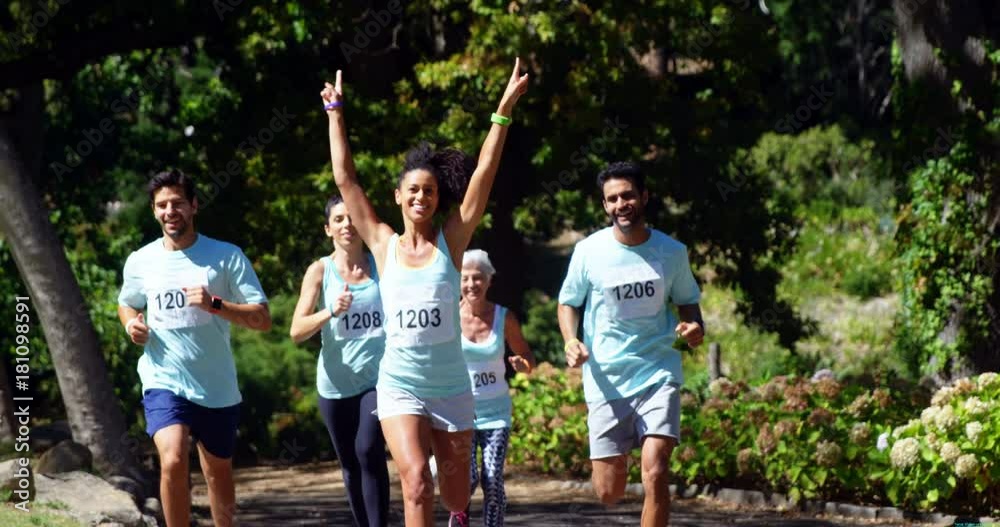 Mixed race woman athlete winning the marathon race 