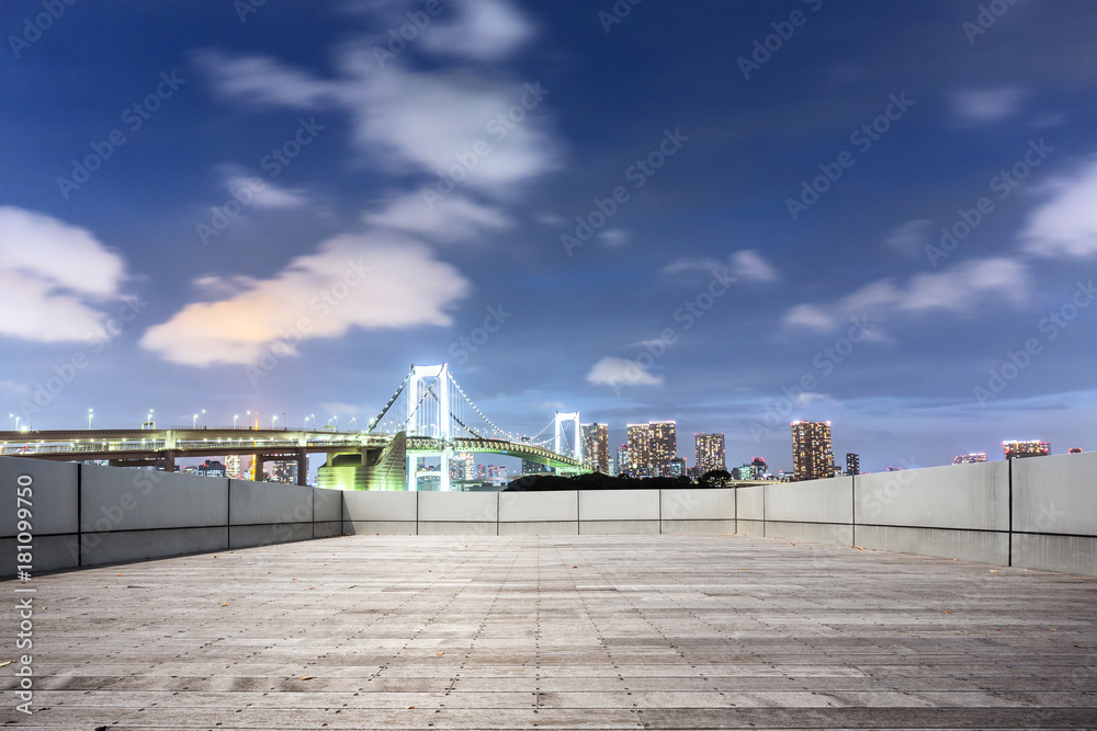 Obraz premium empty brick floor with modern cityscape