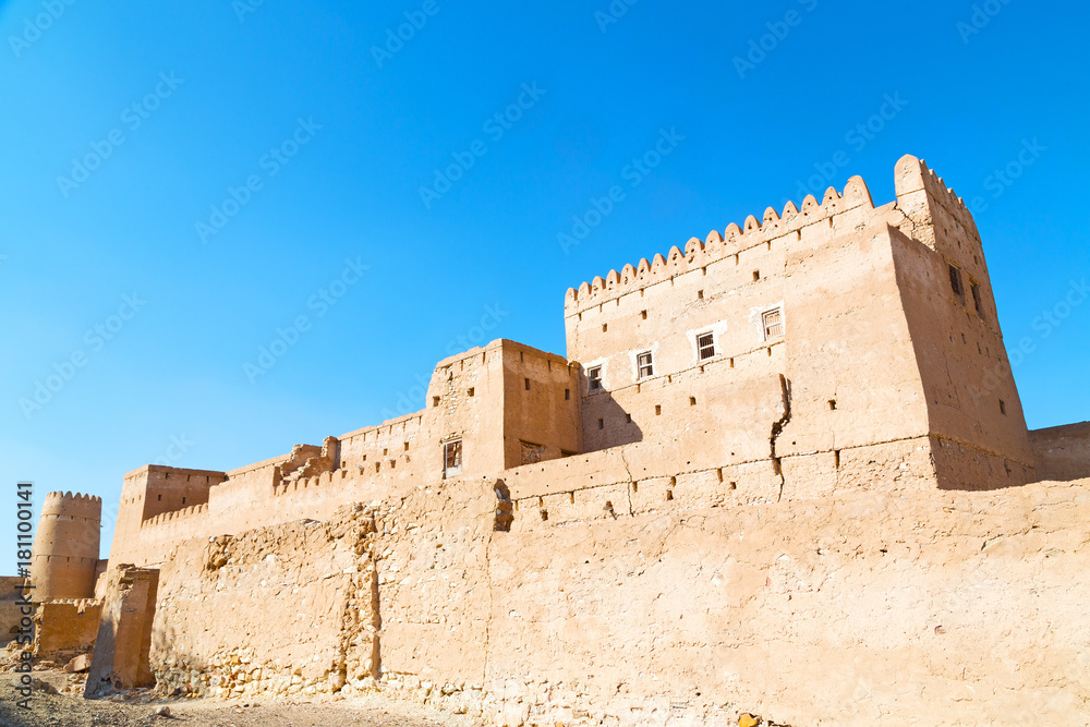 in oman    muscat    the   old defensive  fort battlesment sky and  star brick