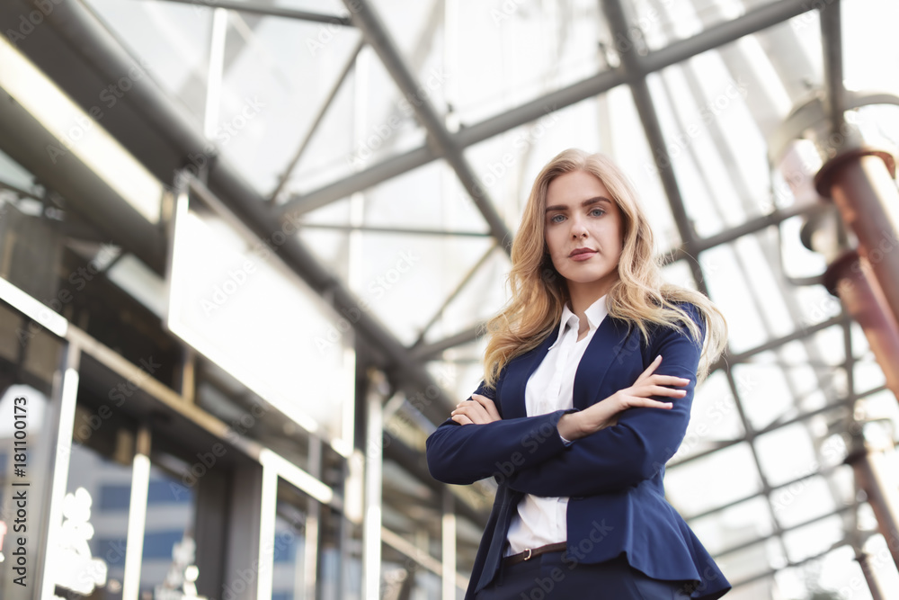 Young businesswoman standing outdoors Young businesswoman standing outdoors