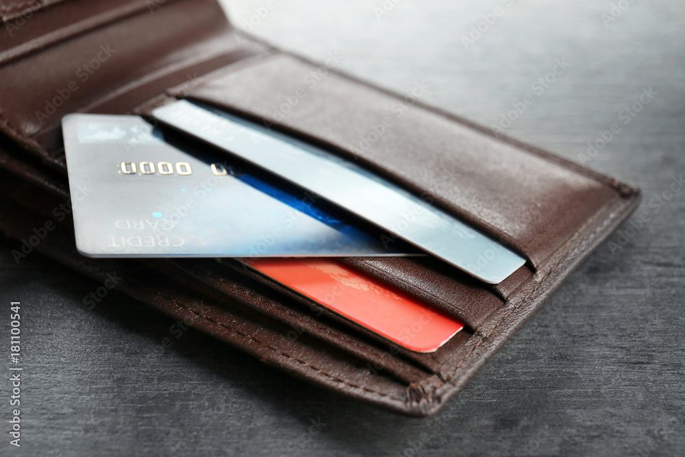 Wallet with credit cards on table, closeup Wallet with credit cards on table, closeup