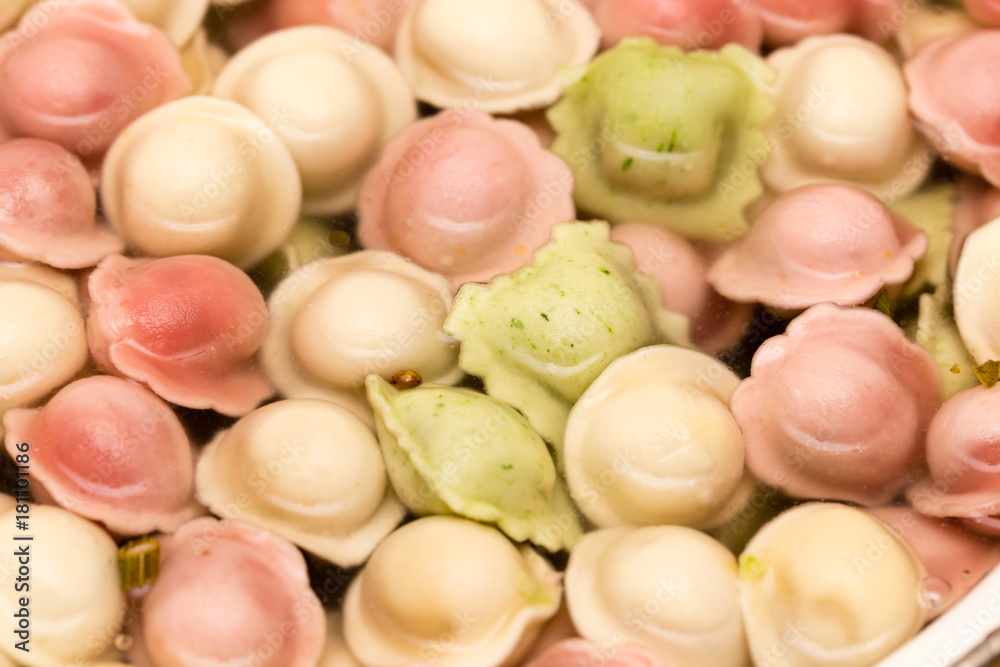 multicolored dumplings are cooked in the kitchen multicolored dumplings are cooked in the kitchen