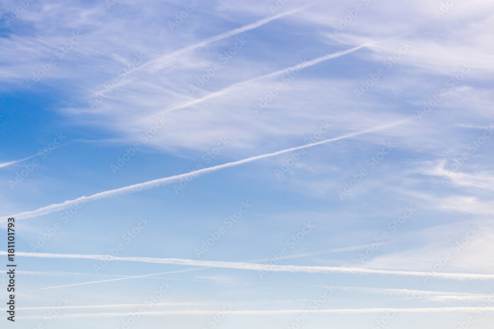 traces of an airplane on a blue sky traces of an airplane on a blue sky
