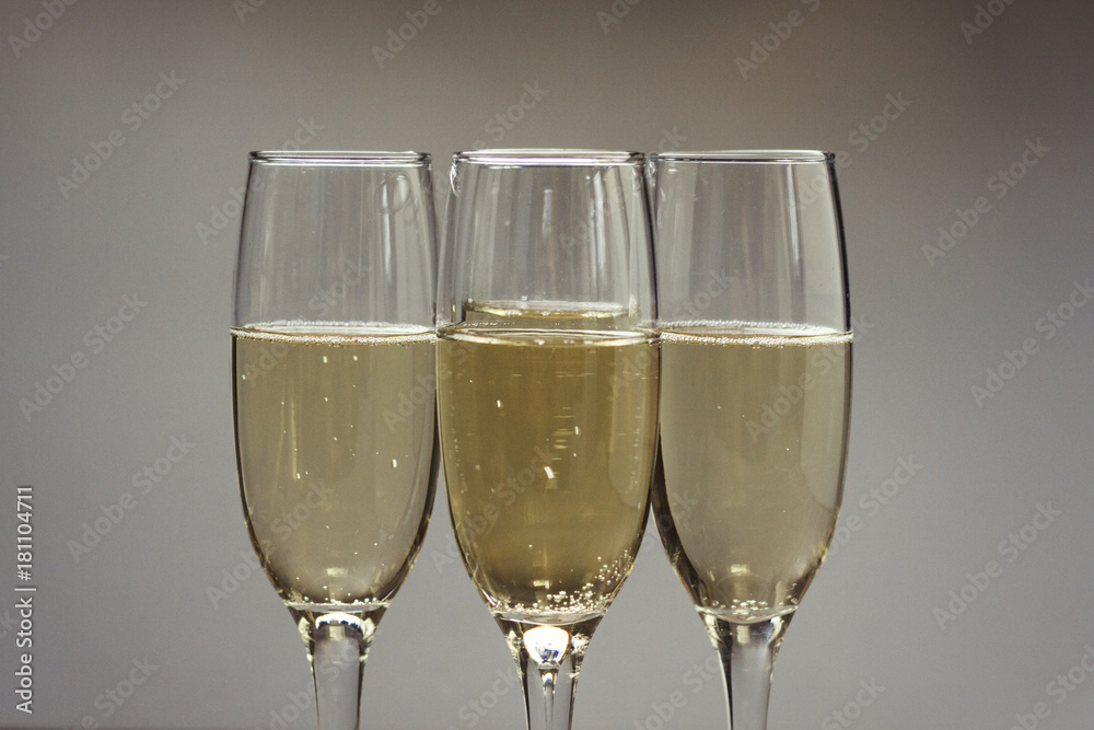 Three glasses of champagne. Background. Three glasses of champagne. Background.