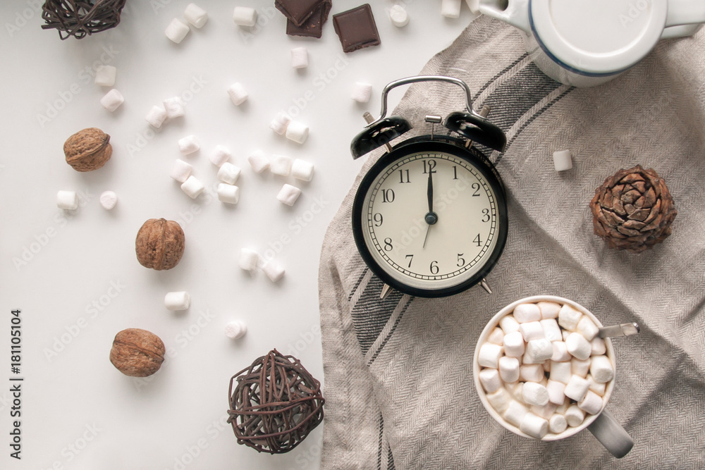 New year mood. the expectation of the holiday. vintage watches, chocolates, marshmallows, sweets, candies, lollipops. winter. New year mood. the expectation of the holiday. vintage watches, chocolates, marshmallows, sweets, candies, lollipops. winter.