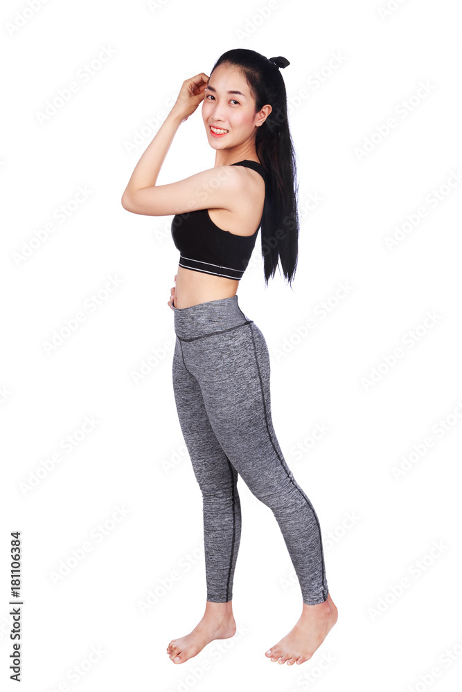 Portrait of smiling fitness young woman isolated on white background Portrait of smiling fitness young woman isolated on white background