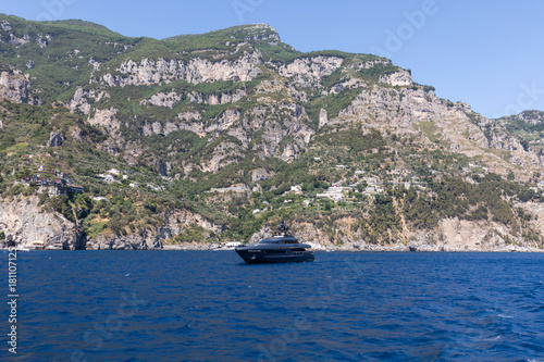 Luxury crewed motor yacht on the Amalfi Coast near Positano, Campania. Italy © wjarek