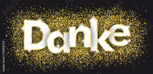 Das Wort Danke auf goldenem Sand