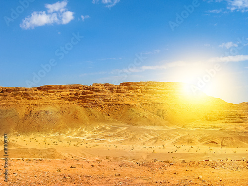 Desert background. Beautiful landscape of spectacular gorge of Colored Canyon, near Mount Sinai and Nuweiba, Sinai Peninsula in Egypt. Sunset light with copy space.