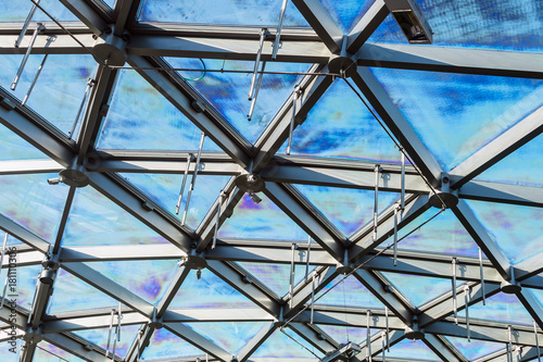 glass roof of building with views of the sky through the glass