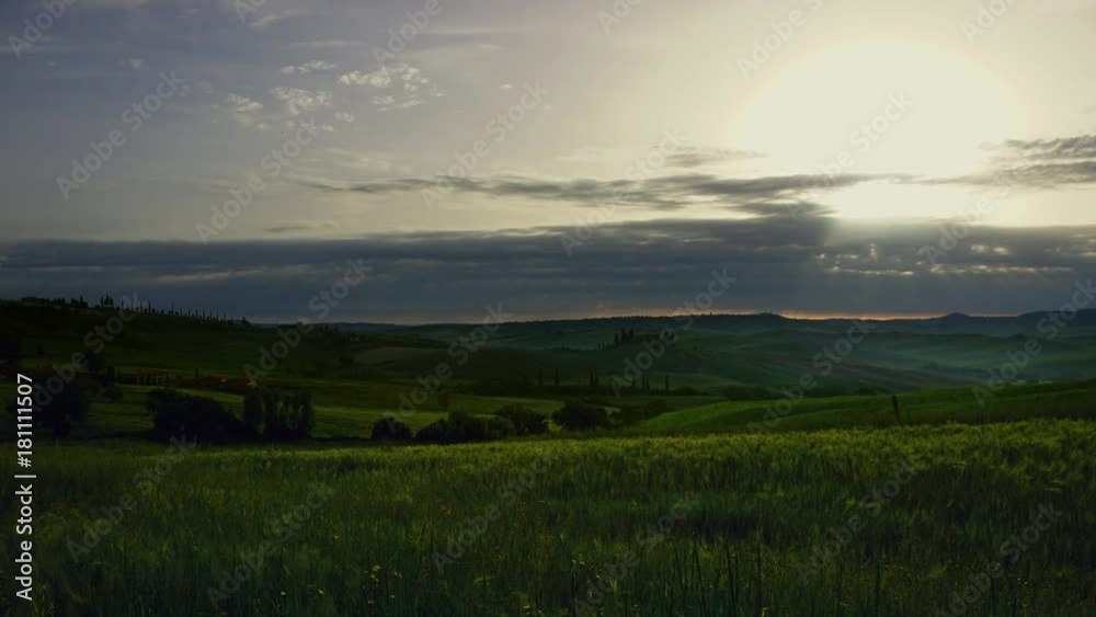 Tuscany landscape at sunrise with farm house and hills, Italy, timelapse 4k
Tuscany landscape at sunrise with farm house and hills, Italy, timelapse 4k