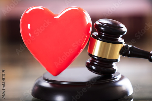 Close-up Of Red Heart And Gavel