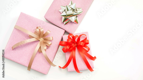 Three pink gift box on a white background.