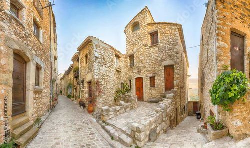 Fototapeta Naklejka Na Ścianę i Meble -  Narrow street of medieval mountain village Tourrettes-sur-Loup, Alpes-Maritimes, France