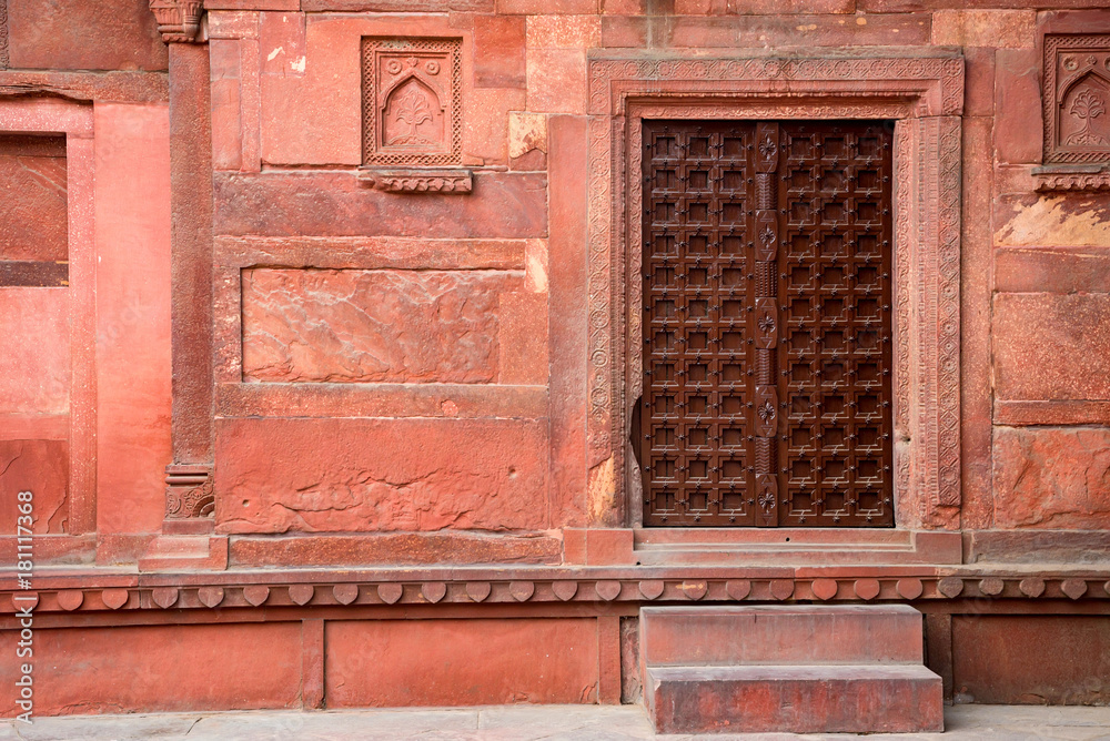 Old vintage red door in India