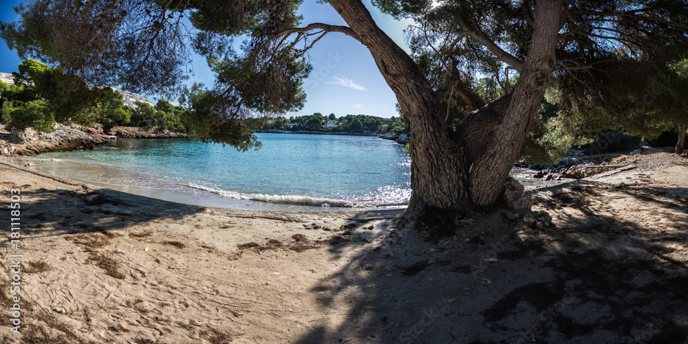 small beach in Majorca. Mediterranean style. Blue waters in the morning. small beach in Majorca. Mediterranean style. Blue waters in the morning.