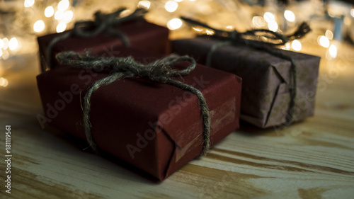 New Year's gifts on the background of festive bright lights concept of the New Year holiday © ALIAKSANDR