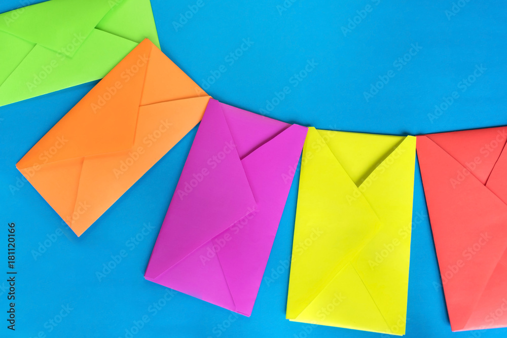 Colorful envelopes on the blue background. Colorful envelopes on the blue background.