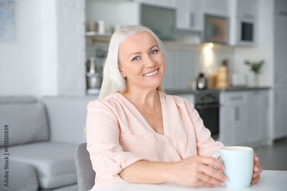 Beautiful mature woman at home Beautiful mature woman at home