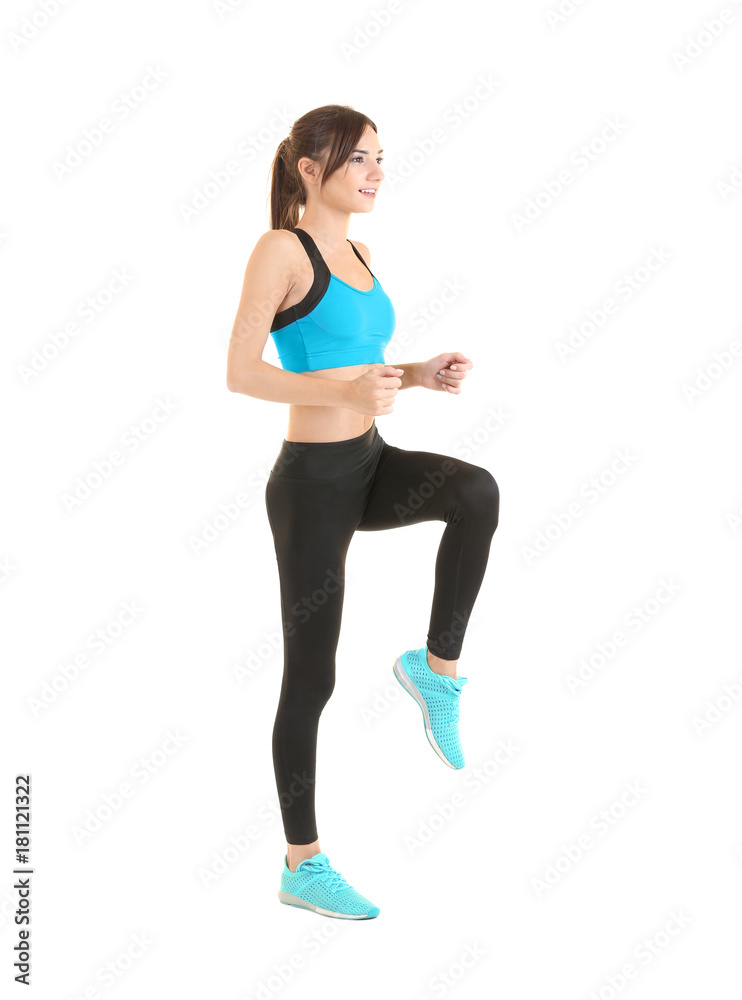Beautiful young woman doing exercises, isolated on white Beautiful young woman doing exercises, isolated on white