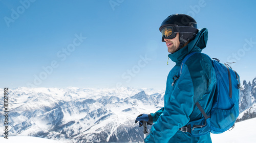 Skier in snow mountain