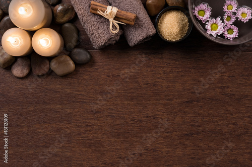 Spa setting with candles on wood