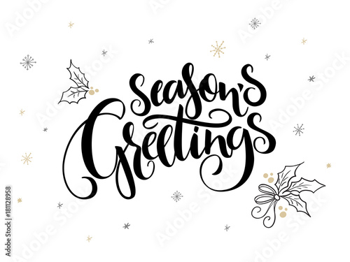 vector hand lettering christmas greetings text - season's greetings - with holly leaves and snowflakes