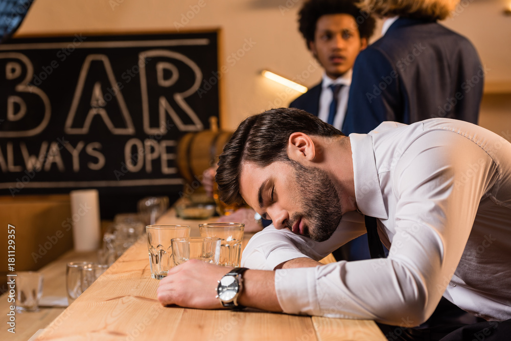 drunk businessman in bar drunk businessman in bar