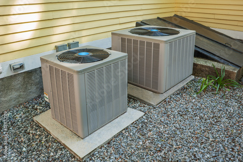 Heating and air conditioning units used to climatize  a home photo