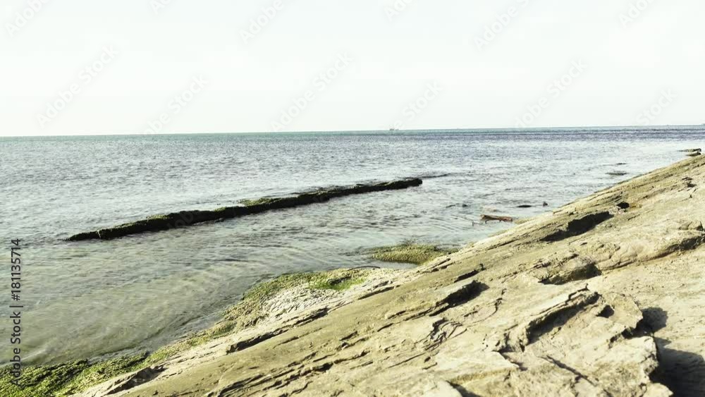 Seascape, calm sea from the rock under the water Seascape, calm sea from the rock under the water