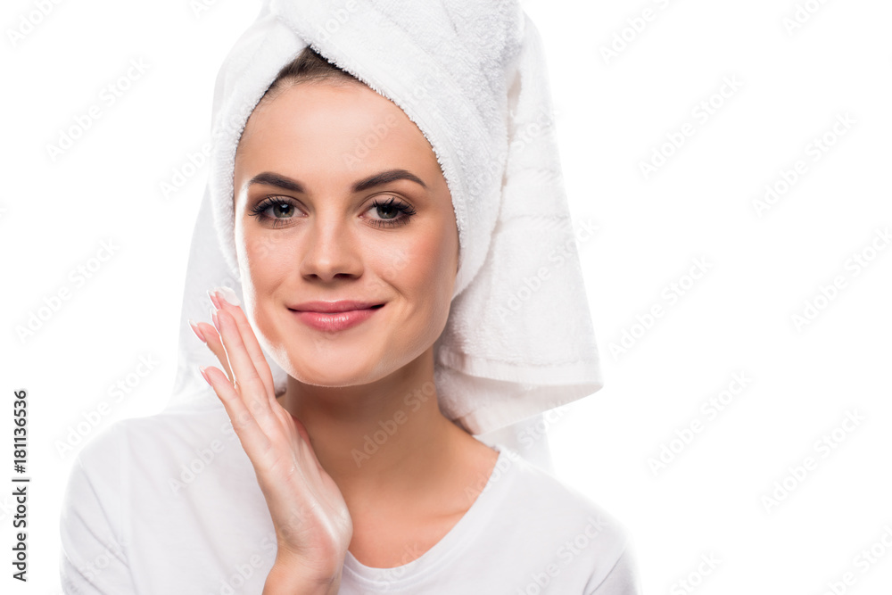 girl applying cream on face girl applying cream on face