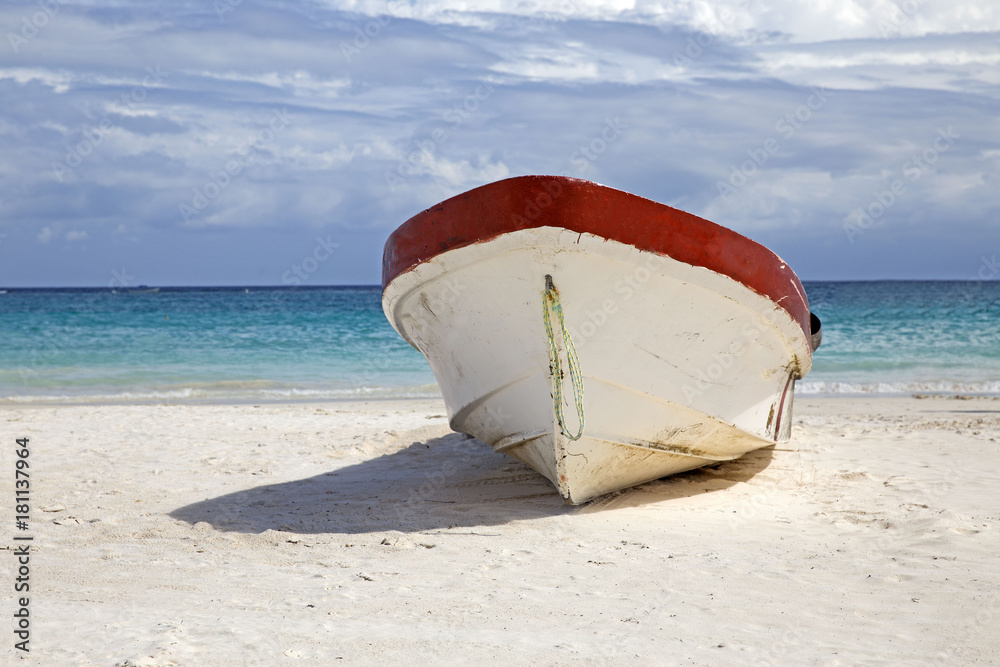 Old wooden fishing boat on mexican beach Old wooden fishing boat on mexican beach