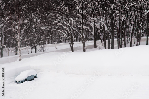 Aerial view of car covered with thick snow at  Mount Hakkoda in winter  Aomori, Tohoku, Japan photo