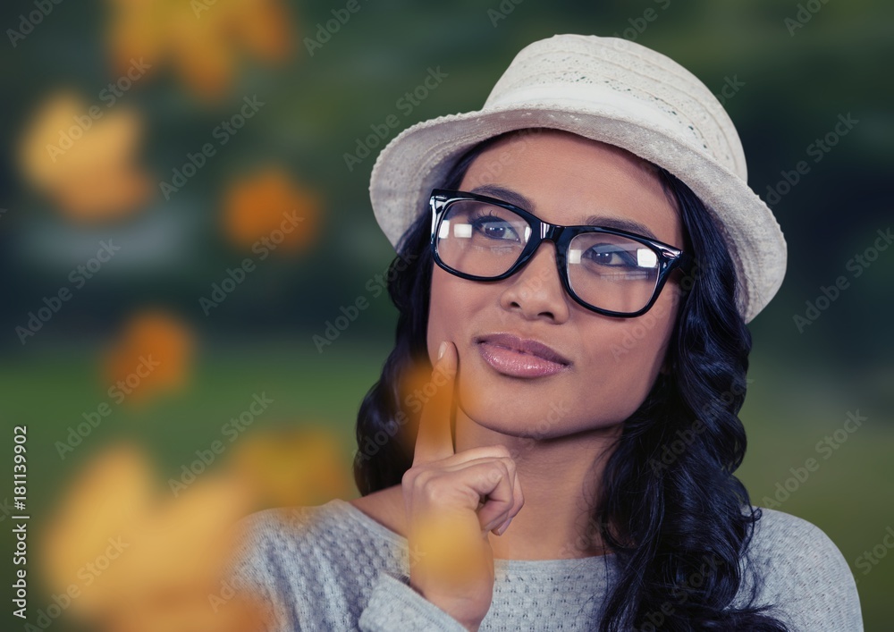 Woman's face in nature with leaves and glasses Woman's face in nature with leaves and glasses