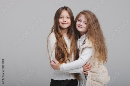 two beautiful girls on white background