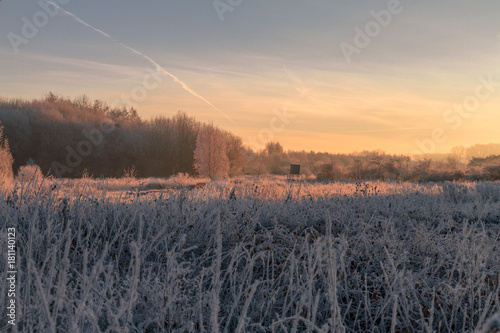 Beautiful Sunrise At Wintertime on A Frosty Field / Wunderschöner Sonnenaufgang auf einem Frostbedecktem Feld
