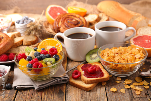 breakfast with coffee,croissant and fruit