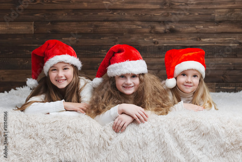  cute happy children with santa hats