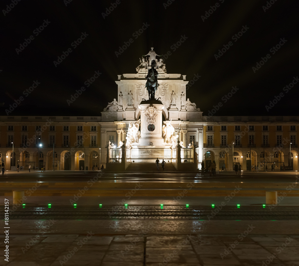 Triumphal Rua Augusta Arch and Statue of Dom Jose in Lisbon at night.
