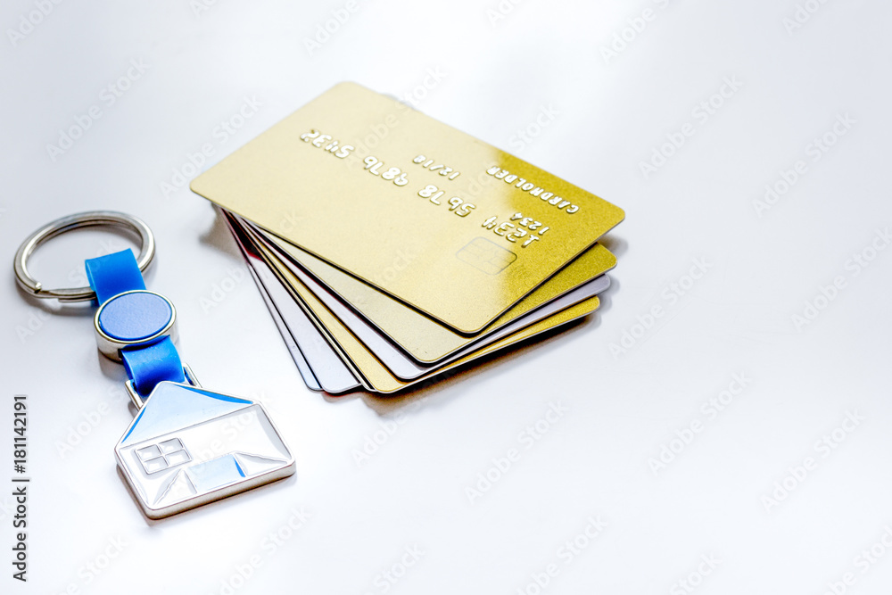 credit cards, key ring - concept mortgage on white background credit cards, key ring - concept mortgage on white background